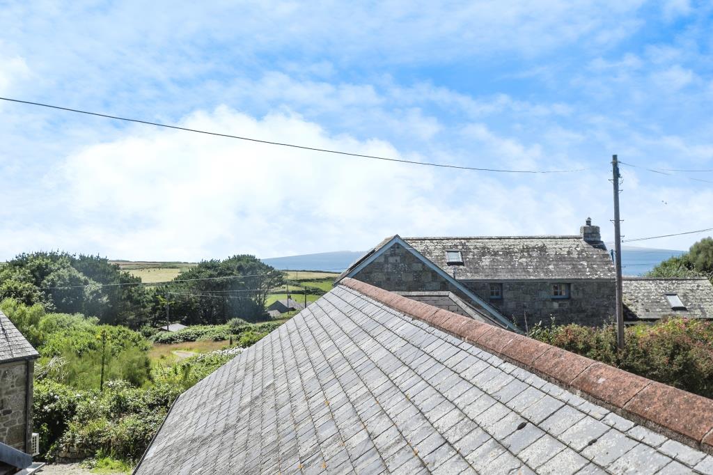 Lot: 72 - DETACHED BARN CONVERSION IN A LOVELY COUNTRYSIDE SETTING - Alternative view of countrywide and sea - photograph provided by seller